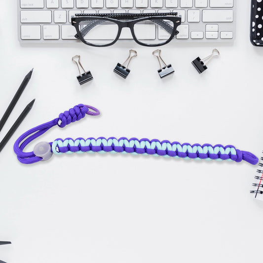 Multicolor adjustable phone wrist strap lanyard displayed on a clean surface.