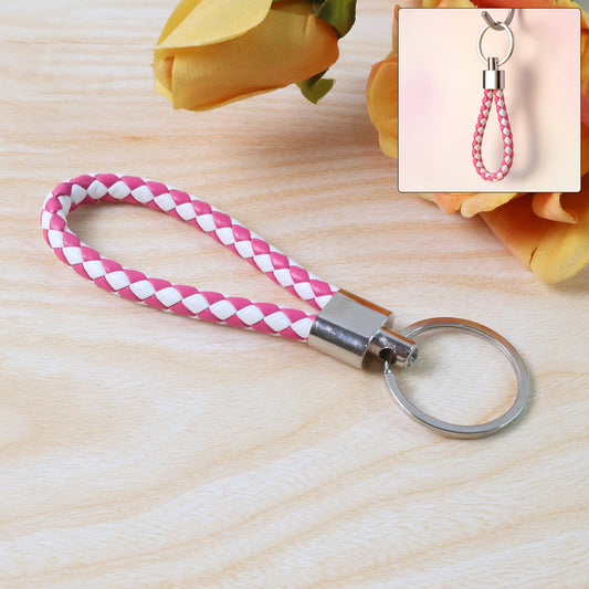 Braided leather keychain featuring durable metal ring and two-tone braid design