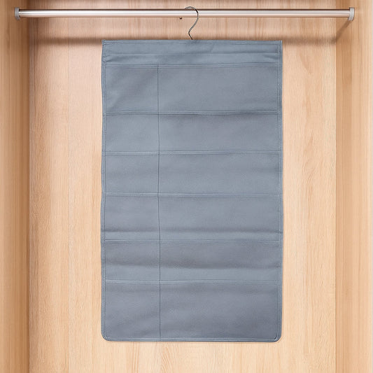 Foldable under garment organizer bag with multiple pockets hanging in closet