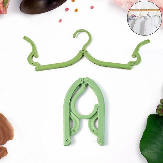 Foldable travel hanger made of durable ABS plastic, ideal for wrinkle-free clothes on the go