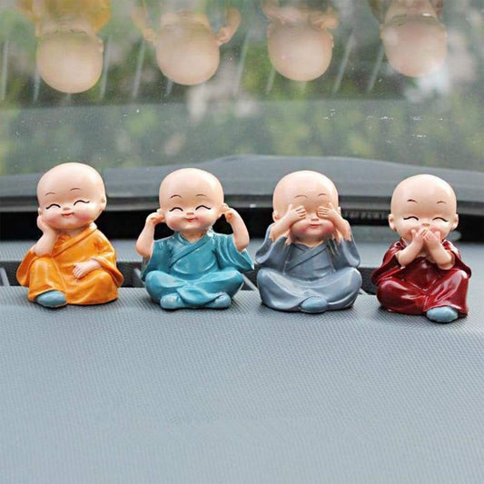 Baby Buddha 4-piece statue set displayed for home decoration