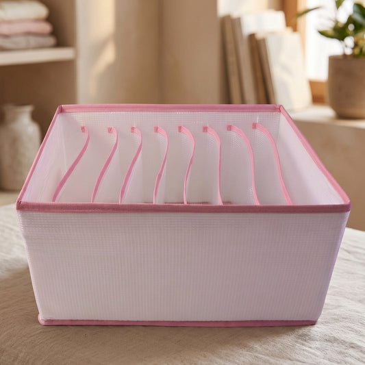Foldable clothes organizer in use with clothes stored in compartments