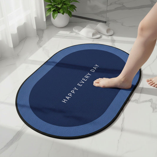 Non-slip oval bath mat with super absorbent velvet surface on bathroom floor